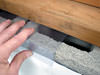Clear plastic vapor barrier covering for block walls in Portland, Bangor, Lewiston
