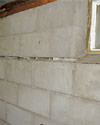 Severely buckling foundation walls in a home in Farmington in need of repairs.