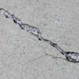 sinking outdoor concrete in need of mudjacking in Portland