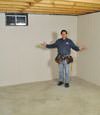 Augusta basement insulation covered by EverLast wall paneling, with SilverGlo insulation underneath