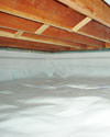 a moisture barrier installed on the walls and floors of a crawl space in Saco