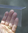 Closeup of a clear plastic covering on a Brunswick crawl space block wall