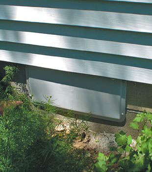 A gray crawl space vent cover in Yarmouth