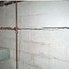 Severe foundation damage from a long crack in a bucking wall of a Westbrook home.