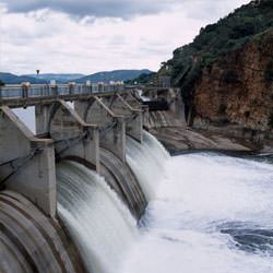 Water gushing through a dam