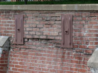 A collapsing, crumbling retaining wall in Brunswick