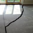 a huge crack in a concrete slab floor in Rochester