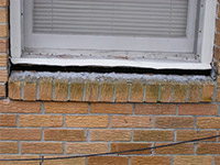 A window sill cracking and separating from the foundation wall in a Somersworth home.