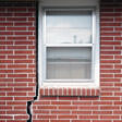 foundation cracks along a window in Dover