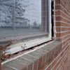 A gap in a window along the outer wall due to foundation settlement of a Westbrook home.
