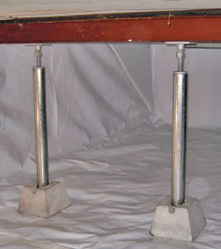 Crawl space jack posts installed in conjunction with a crawl space vapor barrier in Skowhegan