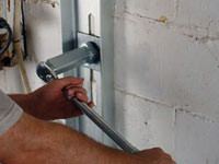 Mounting a foundation wall channel anchor in Waterville.