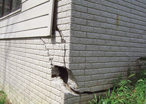 A severely damaged foundation wall in Auburn