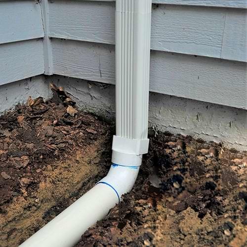 TC Hafford Basement Systems installs gutter downspout extensions in Bangor, Portland, Rochester