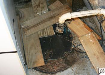 An ugly, clogged sump pump system in Waterville, Maine