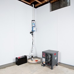 Sump pump system, dehumidifier, and basement wall panels installed during a sump pump installation in Westbrook