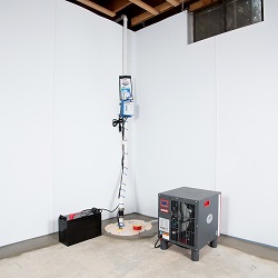 a complete basement waterproofing system installed in a Bangor home