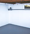 Rochester, ME wet basement wall covering that tucks into a perimeter drainage system