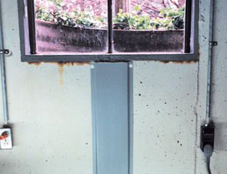 Repaired waterproofed basement window leak in Portsmouth